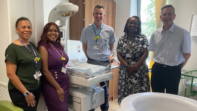 Daniel Elkeles, chief executive of NHS Providers with four members of the team at Lewisham Hospital.