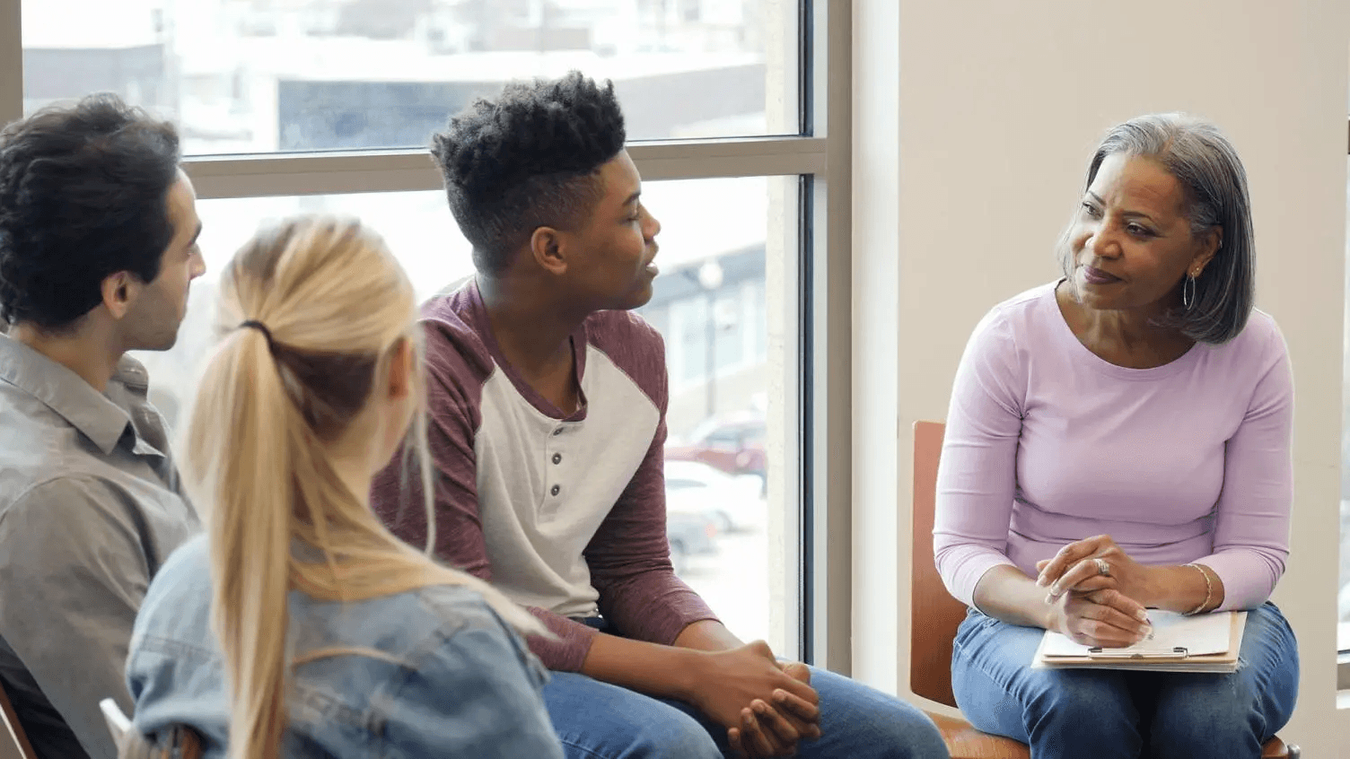 A young person sharing at group counselling